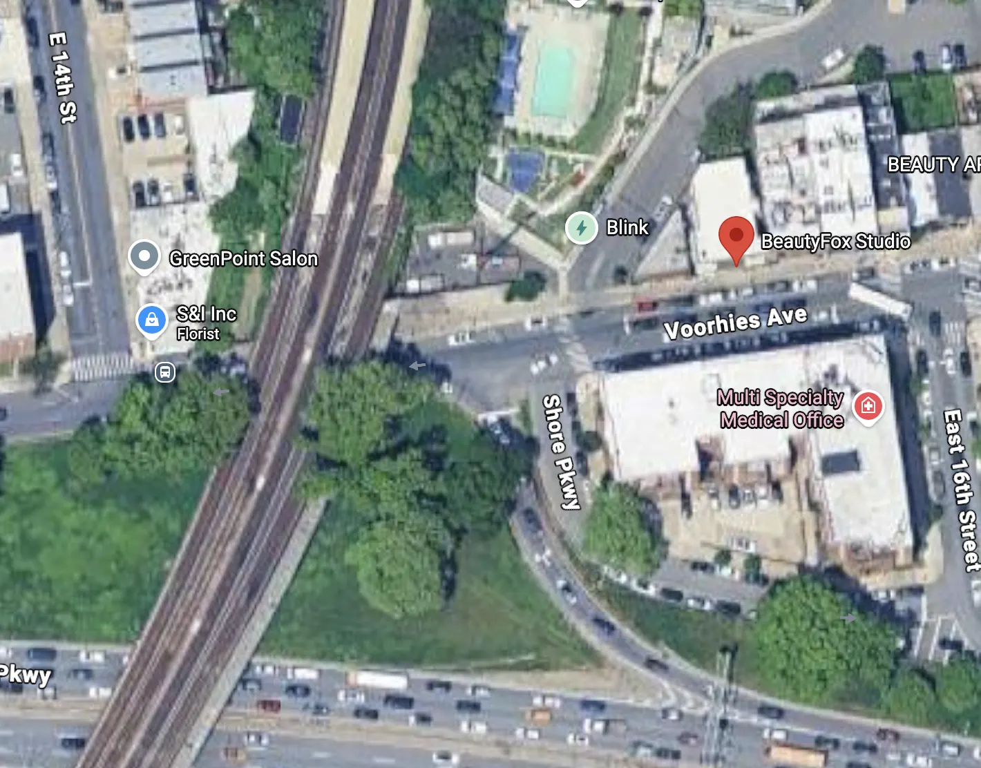 Satellite map: Beauty Fox Studio on the north side of Voorhies Ave, between Shore Pkwy and East 16th Street